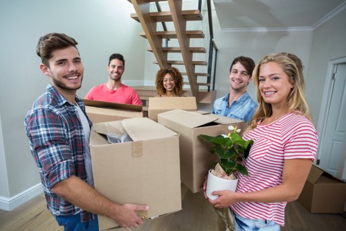 House removalists loading furniture in a Sheffield residential street